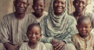 Nigerian couple and children planning with prayer