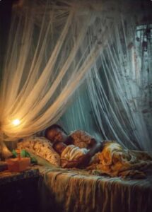 Nigerian mother and newborn baby sleeping under mosquito net during rainy season