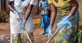 Mothers cleaning the gutter