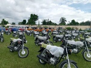 Motorcycles and tricycles on display for distribution during the empowerment.
