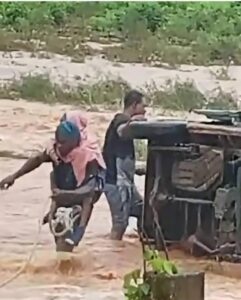 Trapped schoolchildren being rescued from the bus
